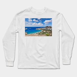 The village of Lindos with a beautiful bay, medieval castle and pictursque houses on a hill is the star of Rhodes, Greece. Long Sleeve T-Shirt